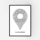 A framed art piece of a word collage of countries in the shape of a pin.