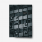 Blue and black photograph of a Buenos Aires apartment building