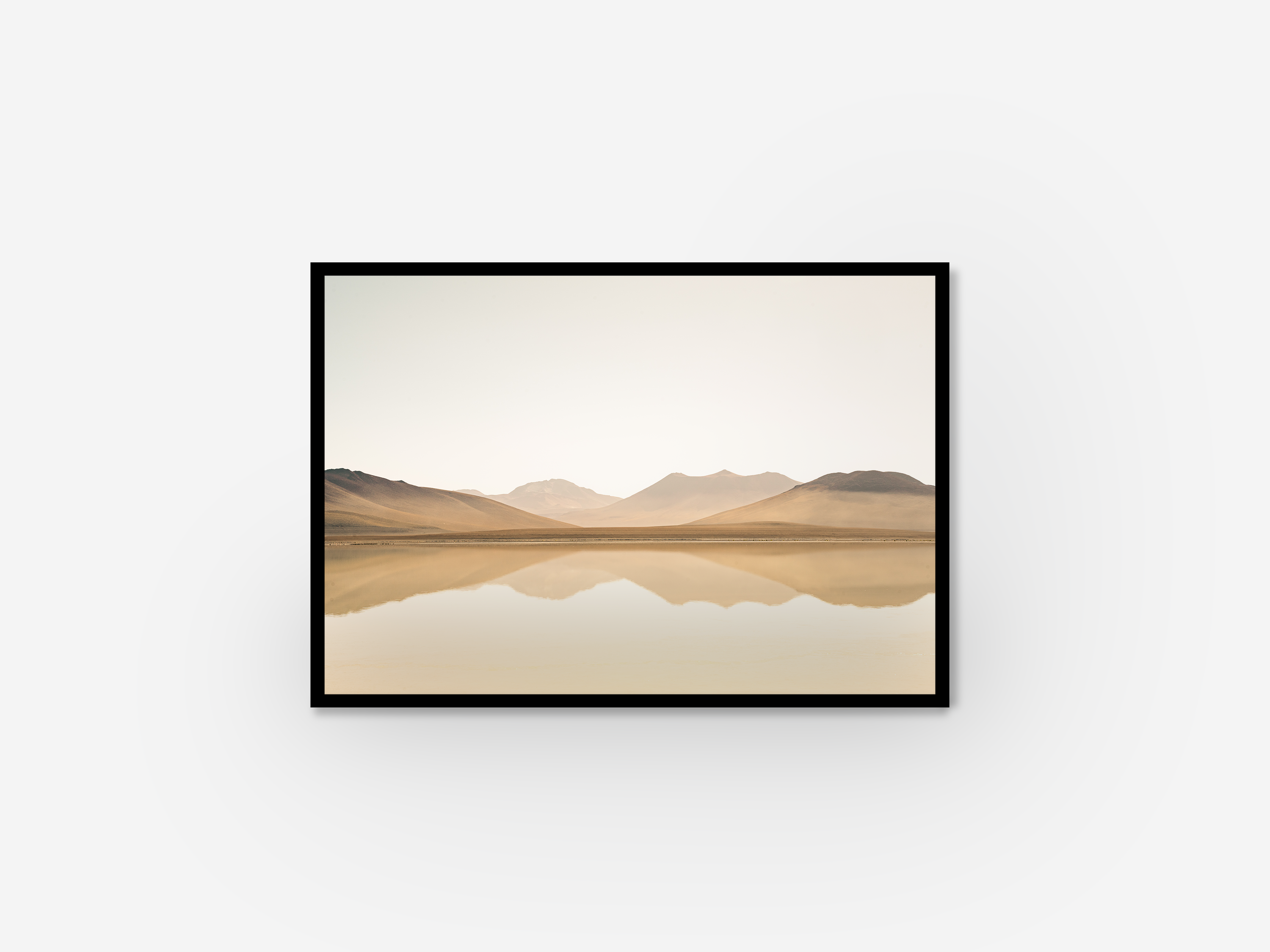 Framed Wall art of a mountain range reflected.