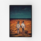 A black framed print of two zebras standing in an orange field surrounded by a dark blue sky.