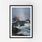 Framed wall art of moutain peaks covered in snow