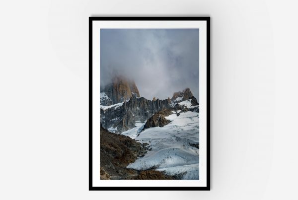 Framed wall art of moutain peaks covered in snow