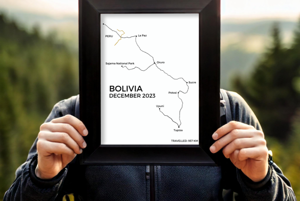 man holding up a line art of backpacking route