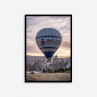 hot air baloon between mountains during sunrise print