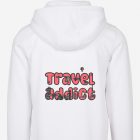pink travel addict text on a white hoodie