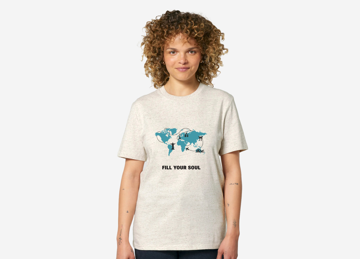 woman wearing a fill your sould tshirt with a blue world map