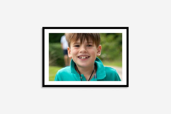 close up close up photograph of a boy