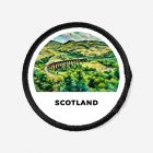 black travel iron on patch of scotish highlands train line